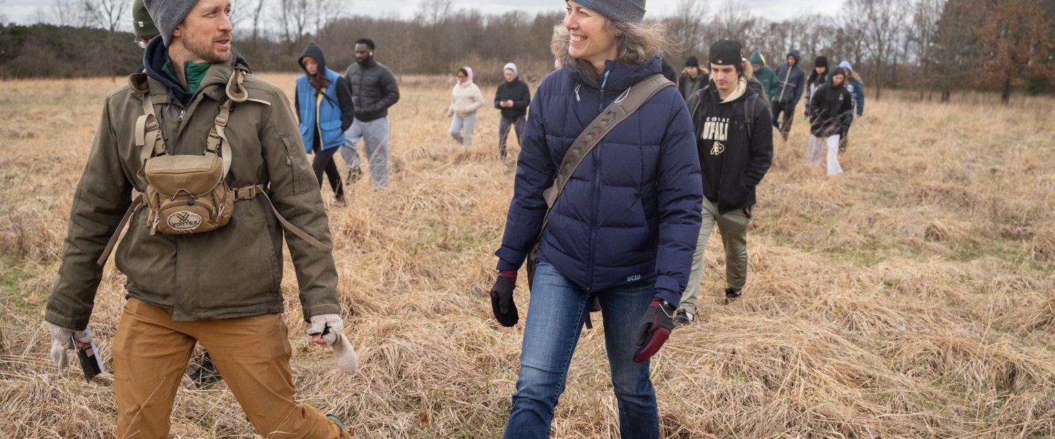 Two faculty members out in the field
