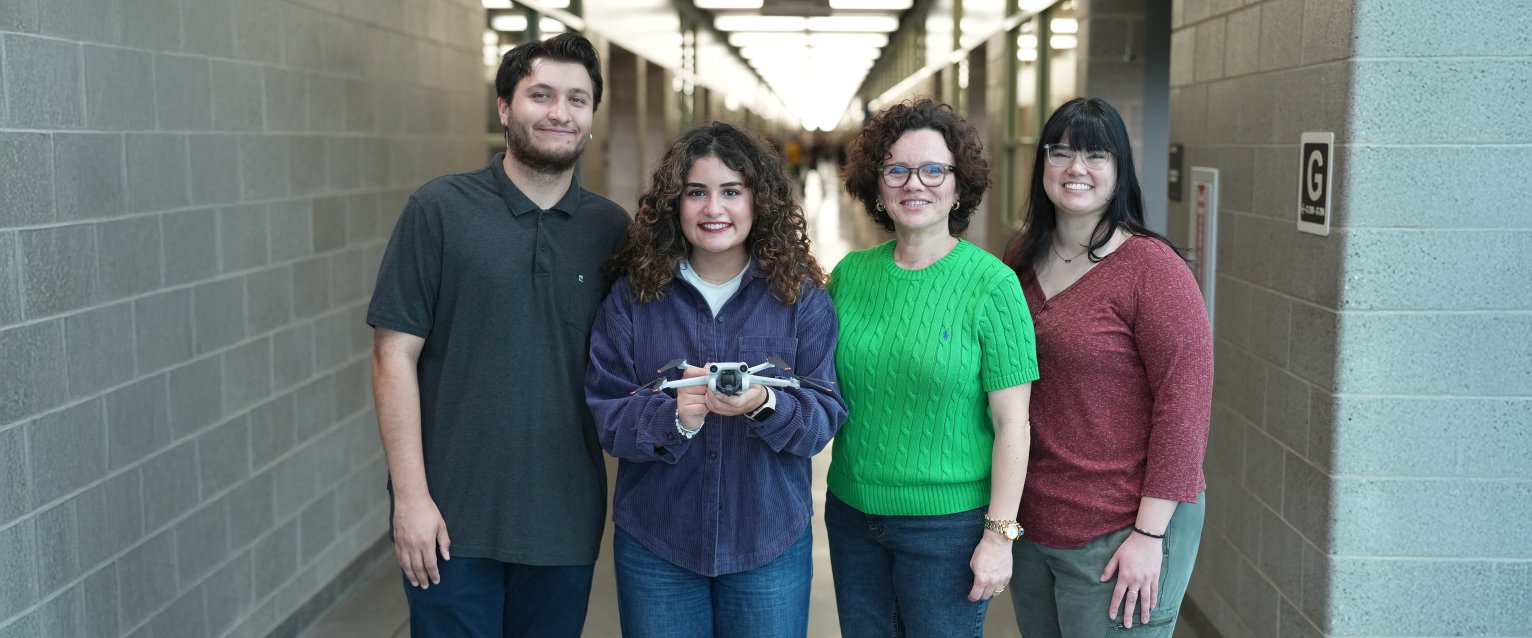 Dr. Ilgin Acar with students and drone