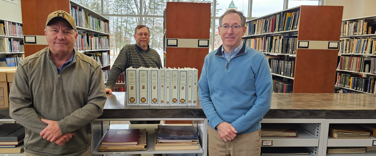 From left to right: Alum Mike Evans, WMU Archives curator John Winchell, and Alum Tom Vance.