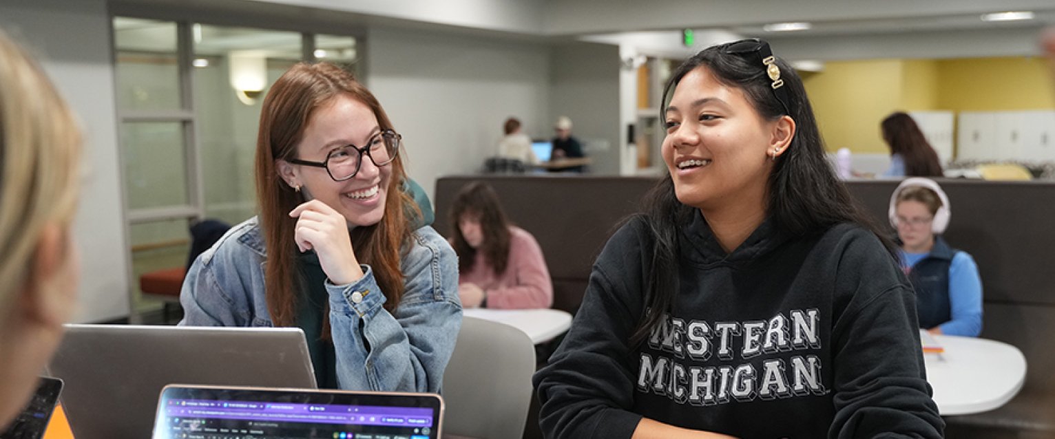 Undergraduate business students in the lounge.