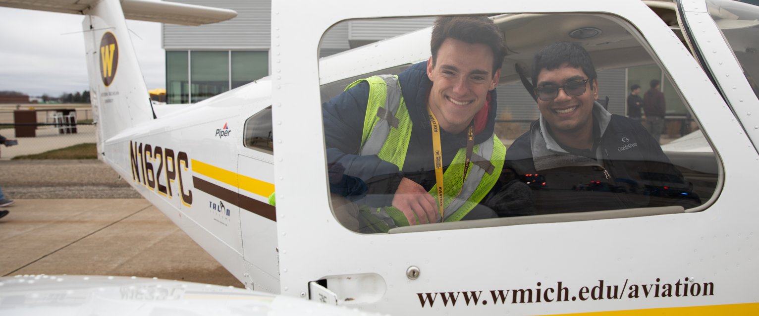 Students in a Piper Seminole.