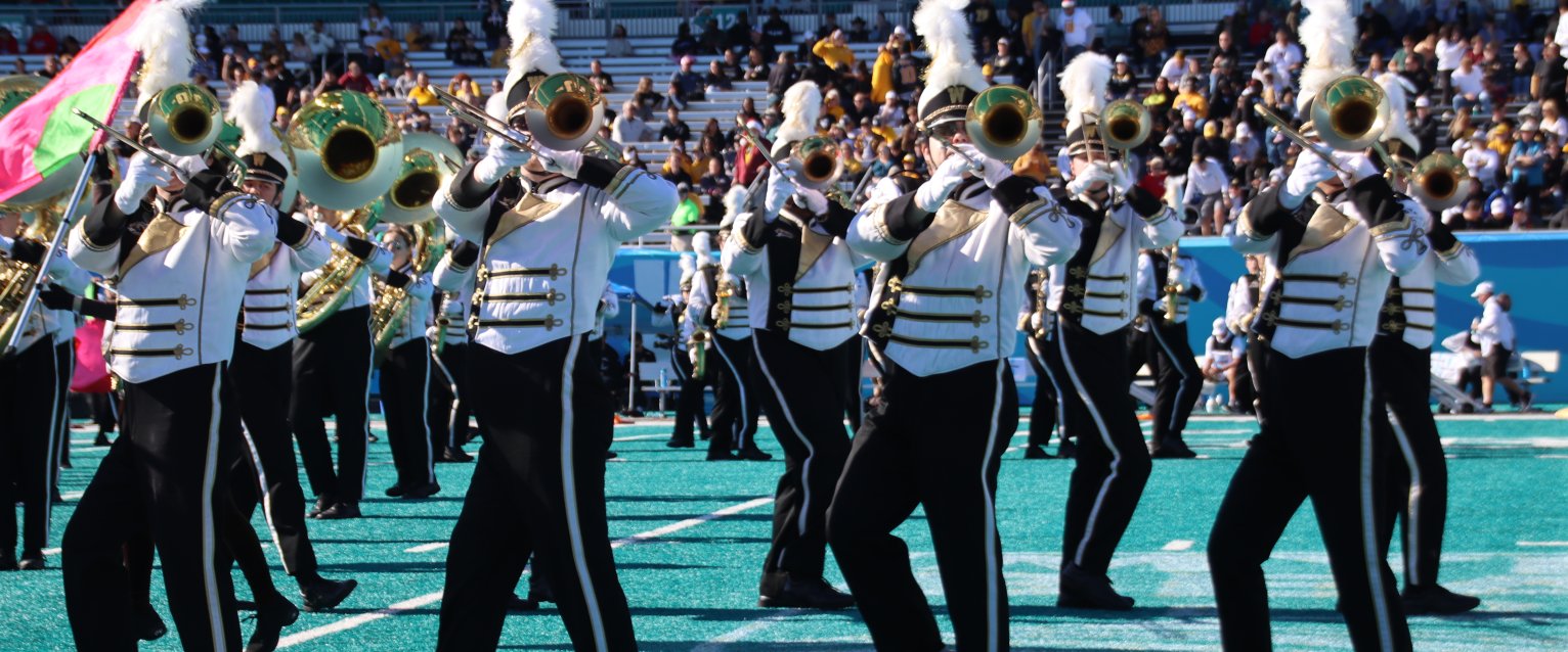 The marching band on the field during the Myrtle Beach Bowl.