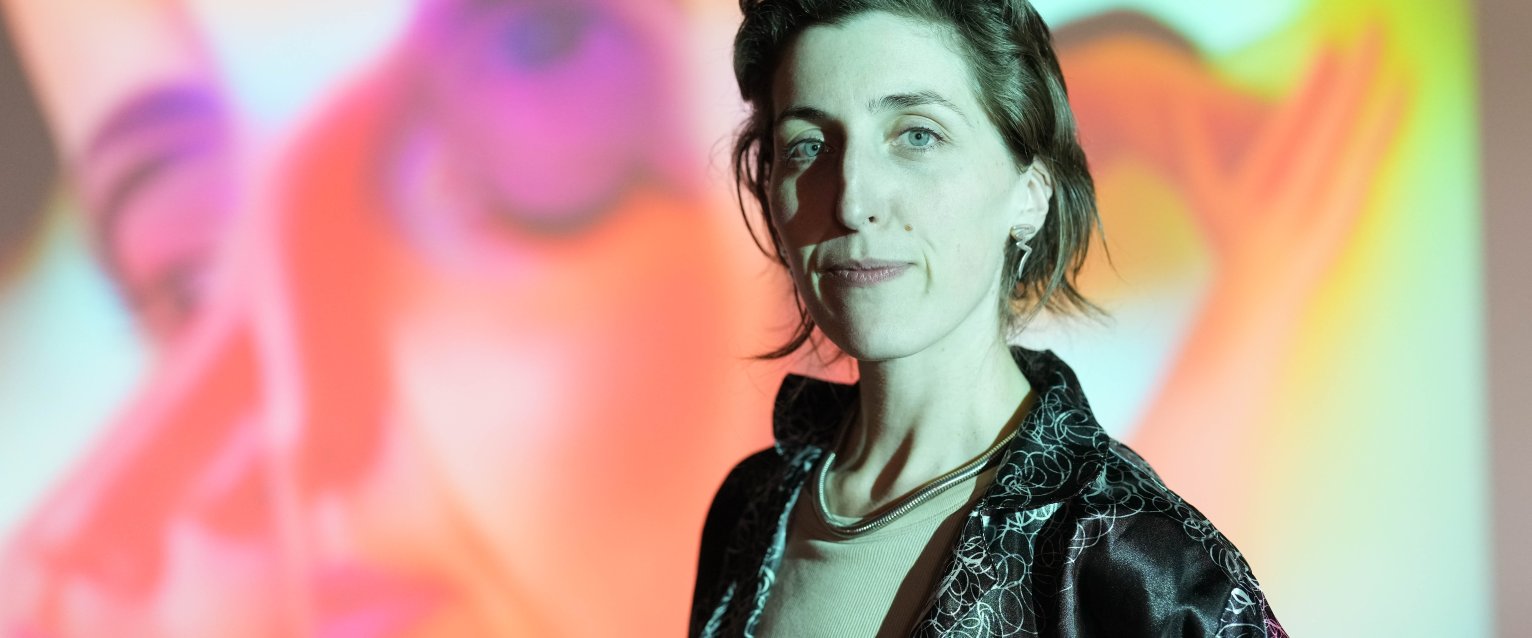  Jess Tucker in front of her work.