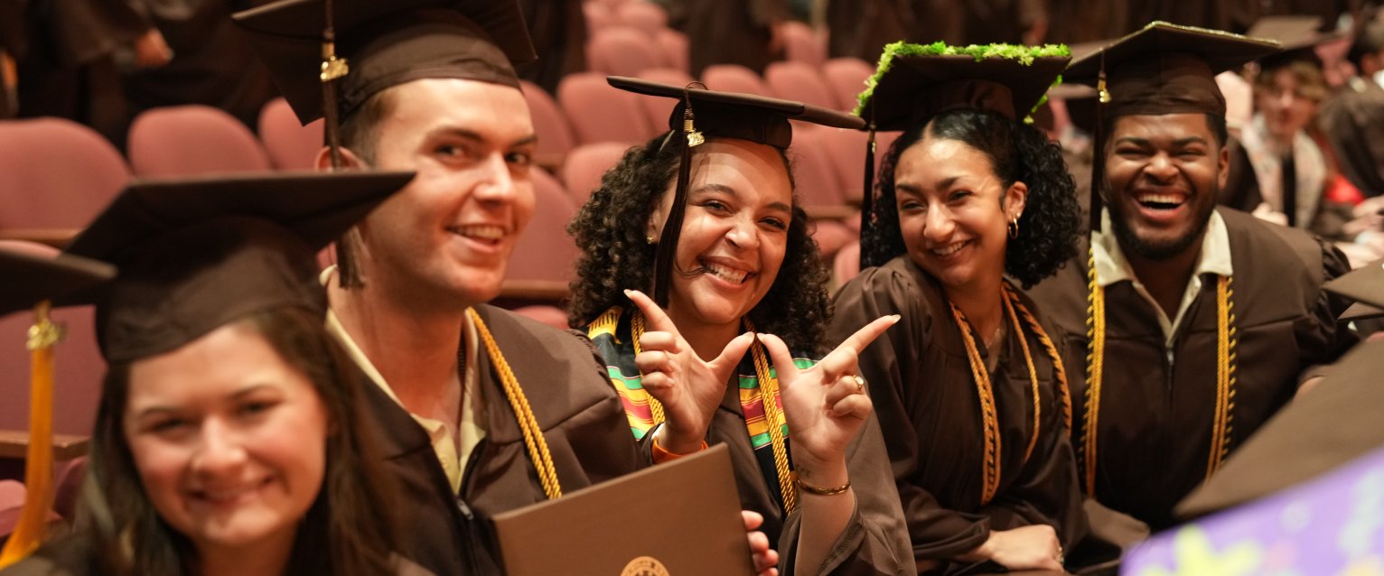 Western Michigan University graduates celebrate at the 2026 commencement ceremony. 