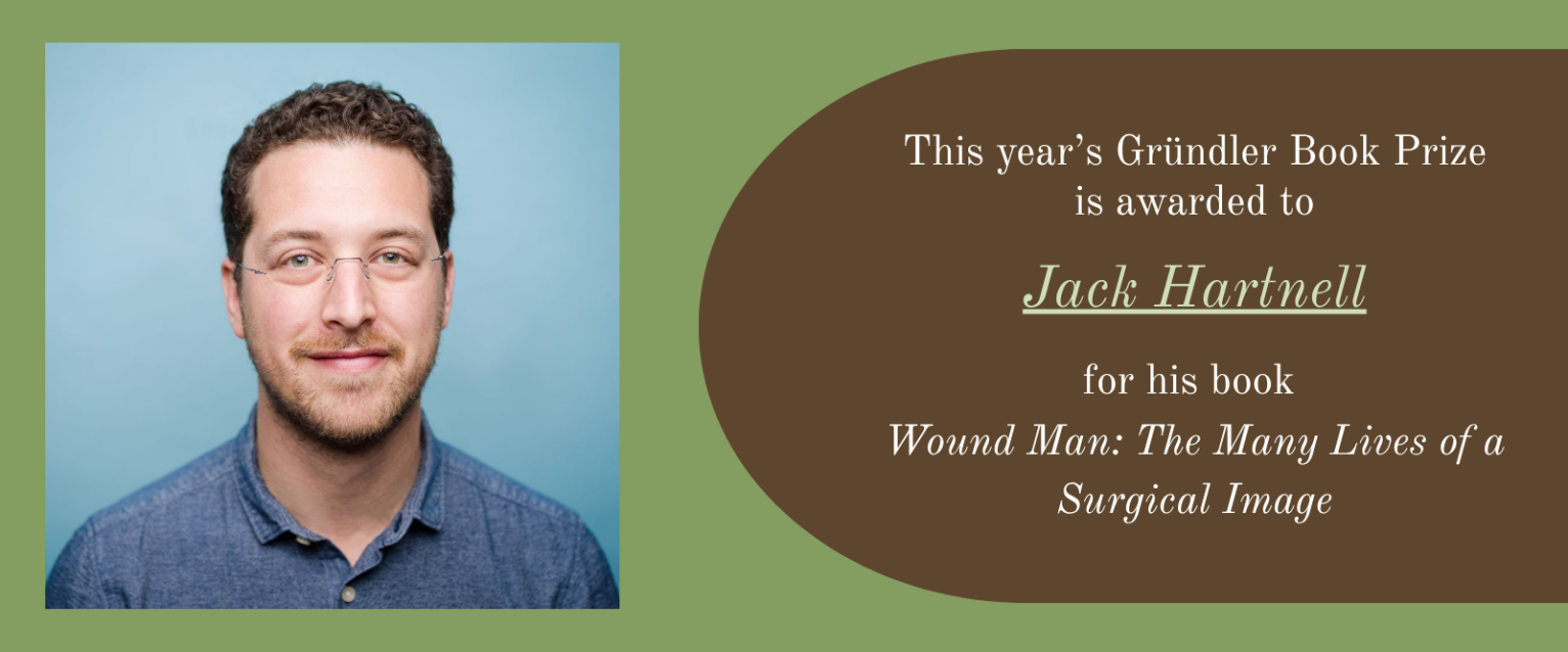 White man with facial hair smiling, text on image reads: "This year's Grundler Book Prize is awarded to Jack Hartnell for his book 'Wound Man: The Many Lives of a Surgical Image.'"