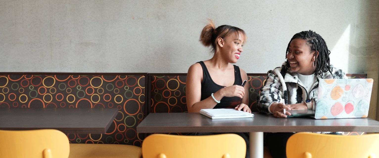 Students studying in a building on campus