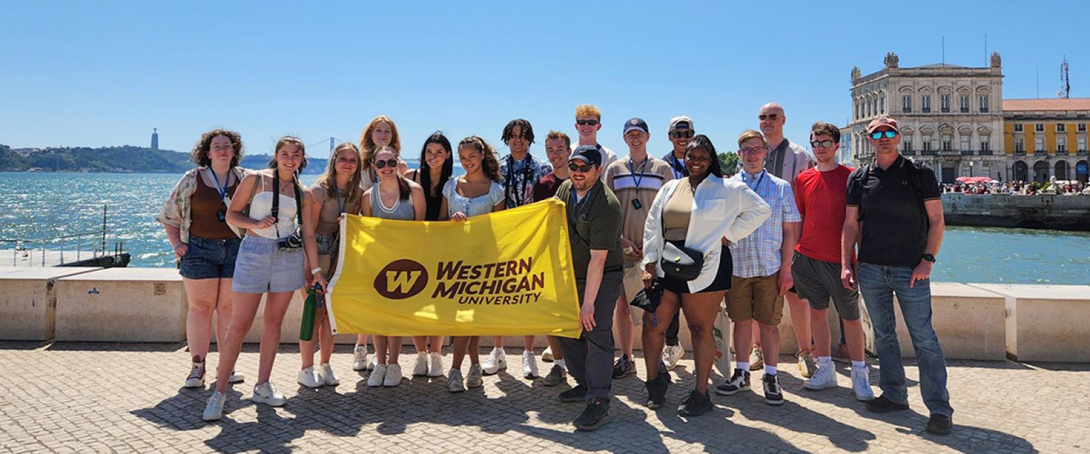 Faculty and Students with the WMU Flag in Venice