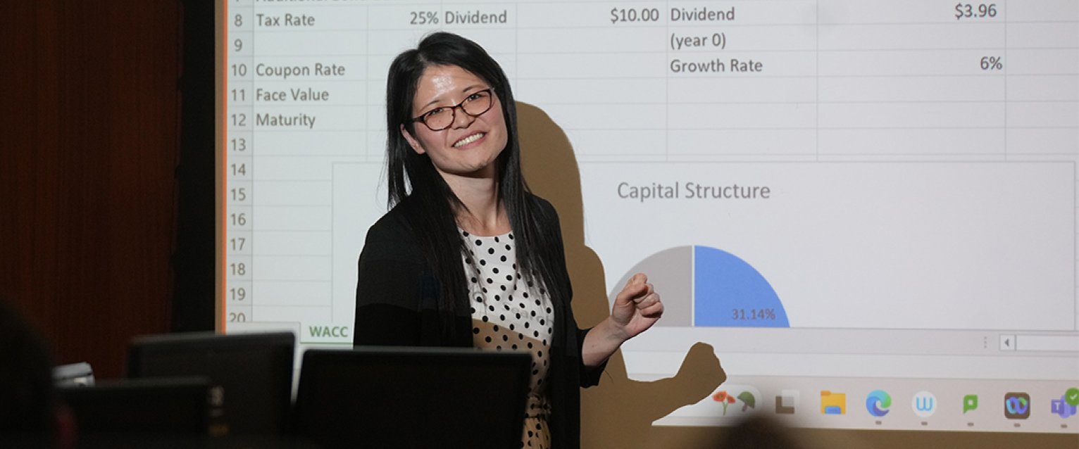 A professor talking to the students