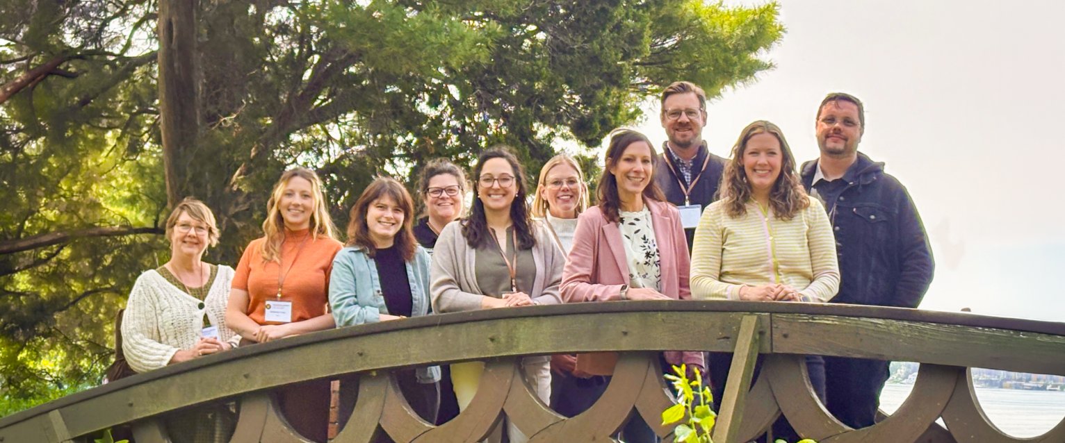 Next Level Leaders 2026 cohort standing on bridge
