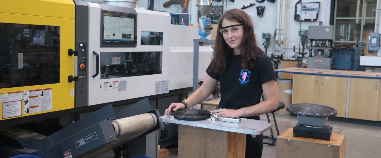 Engineering student working in plastics lab in Floyd Hall