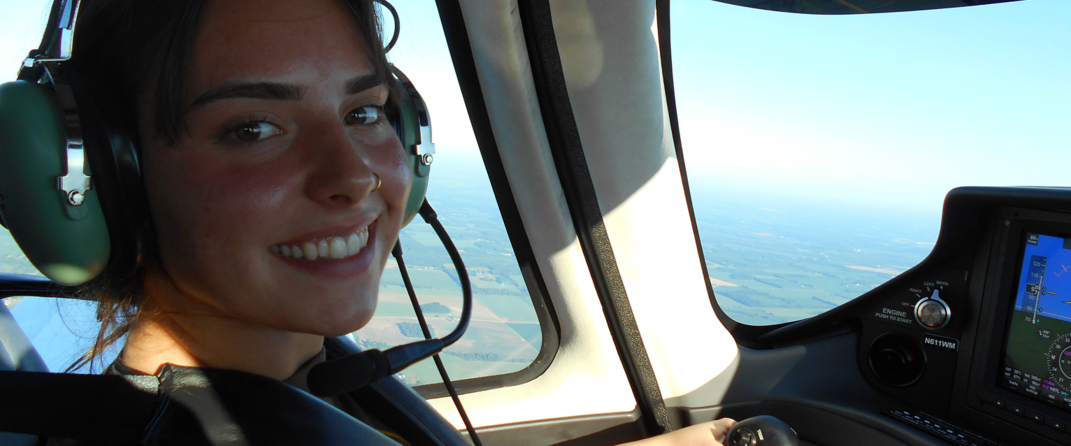 student flying a plane