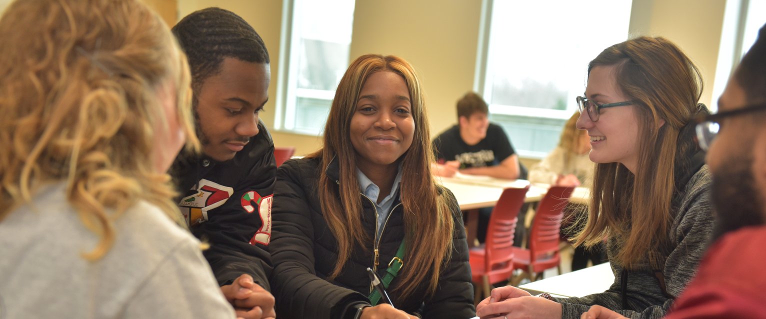 Students collaborate in classroom. 