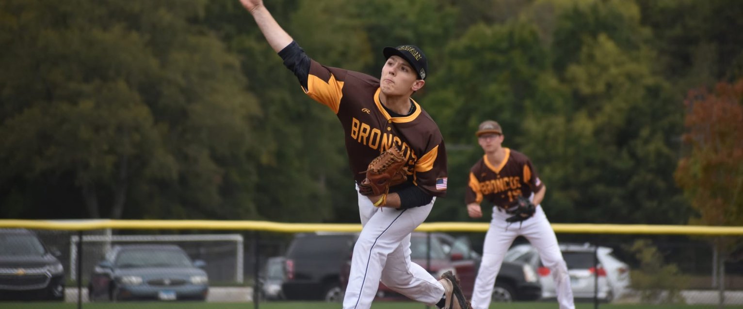 Club Baseball player throwing a pitch