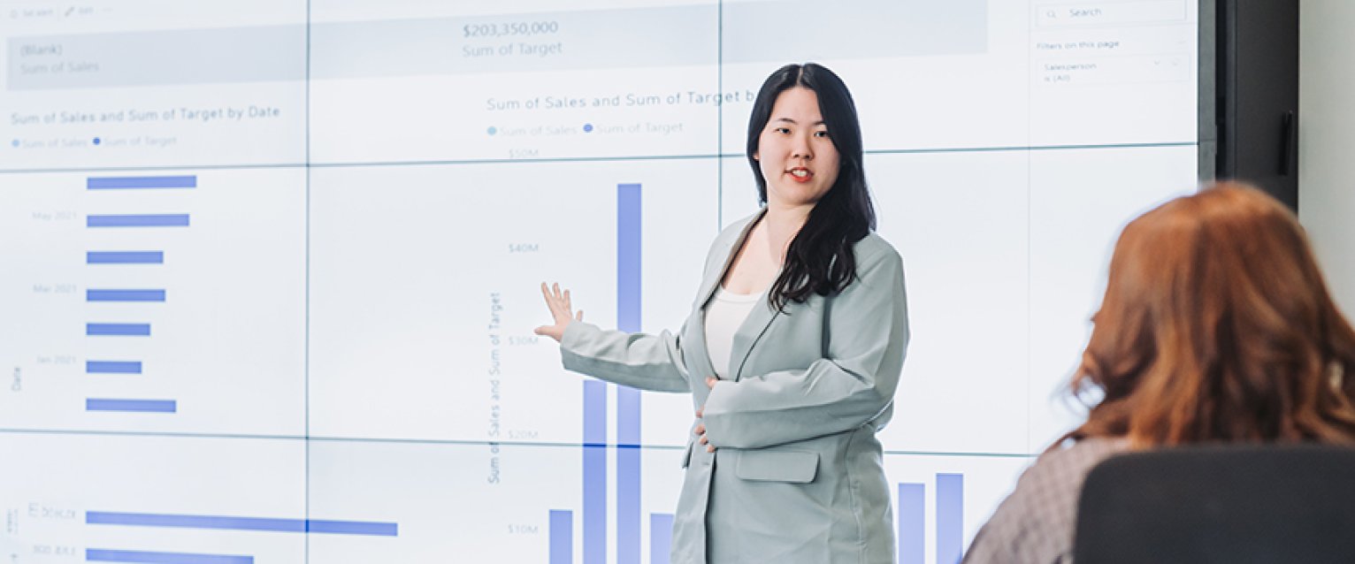 Business Info Systems Main Header of a student presenting
