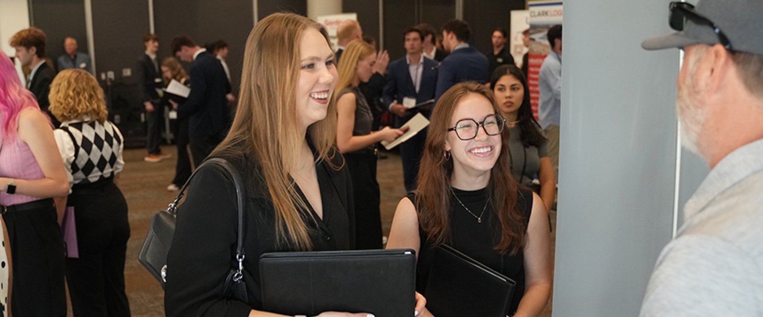 Two students at a career fair