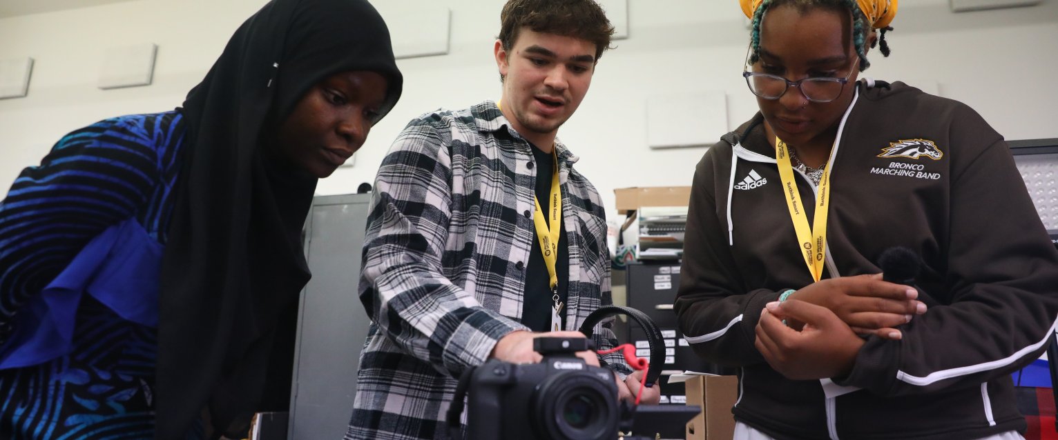 COM students working on a professional project