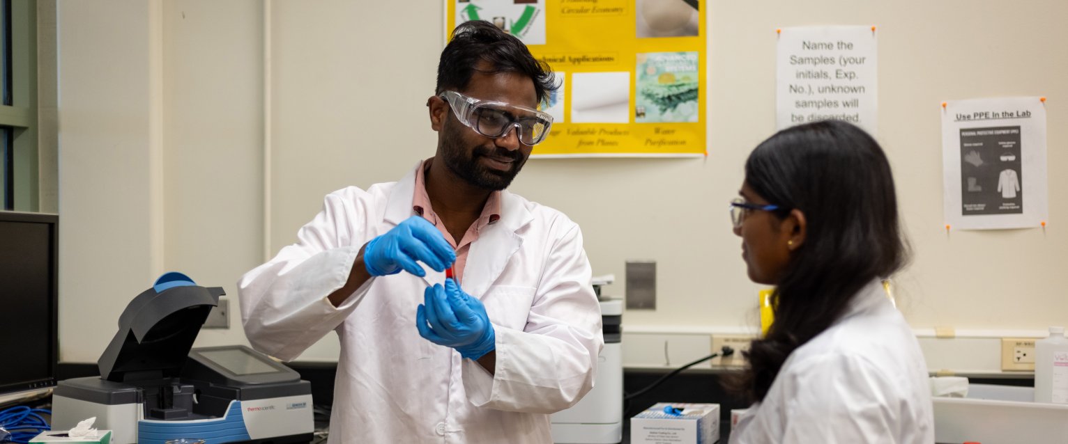 A graduate assistant and dual enrollment student work in the biomaterials and sustainability lab.