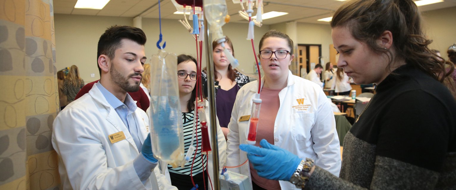 Nursing classroom with several students.
