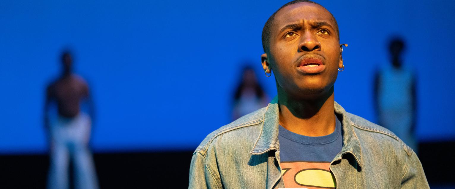 An actor onstage in a play. 