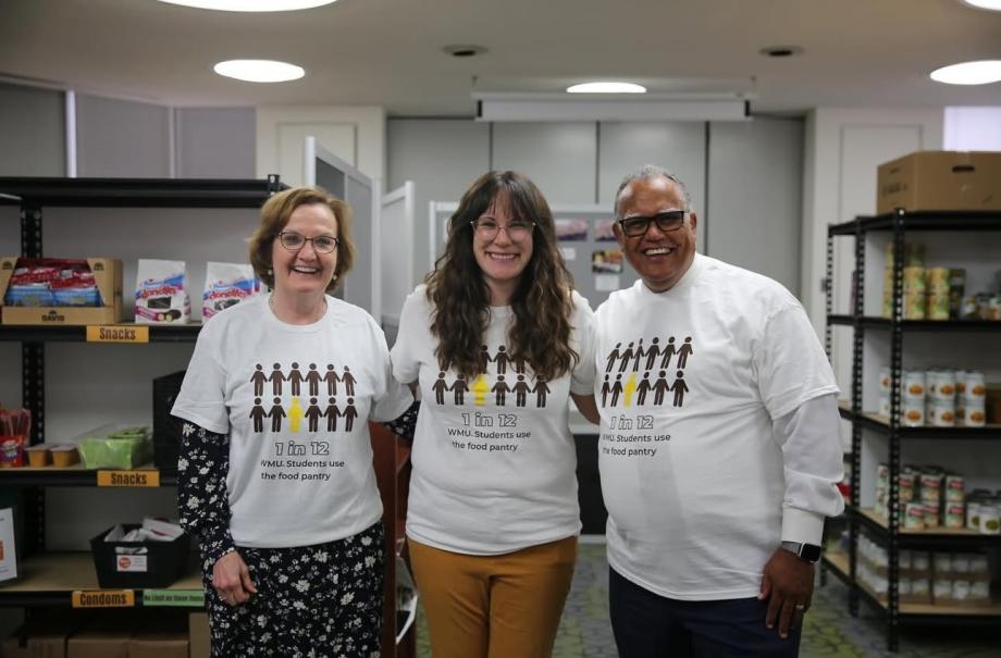 Dr. Diane Anderson, Donielle Easlick and President Edward Montgomery in the Bronco Food Pantry.