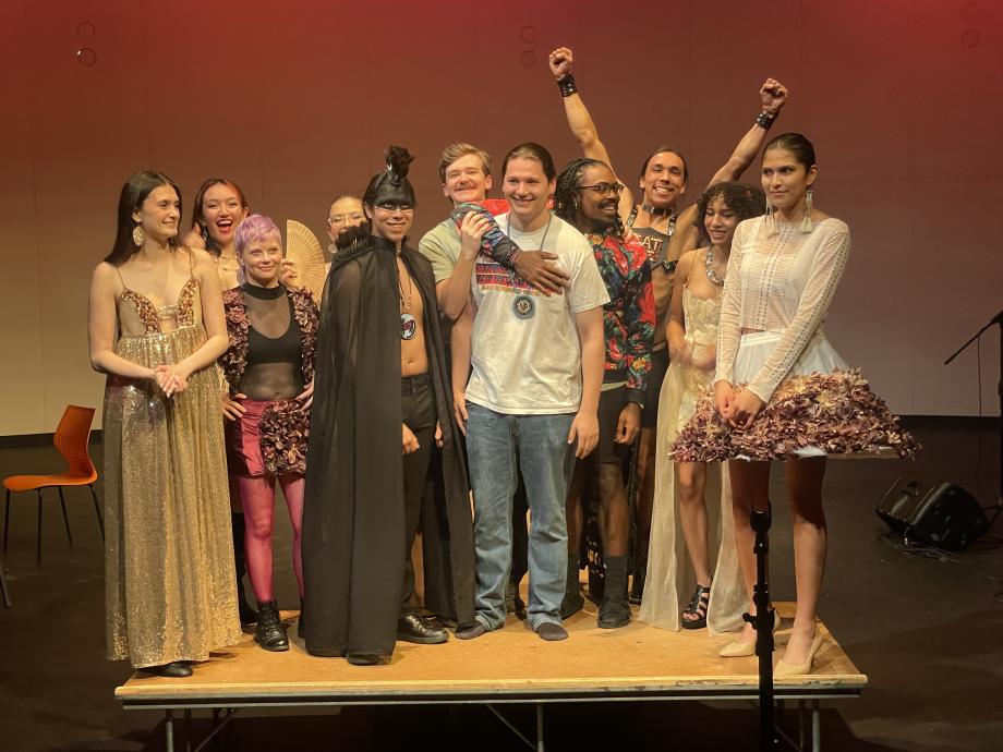 Members of the Native American Student Organization stand together on stage.