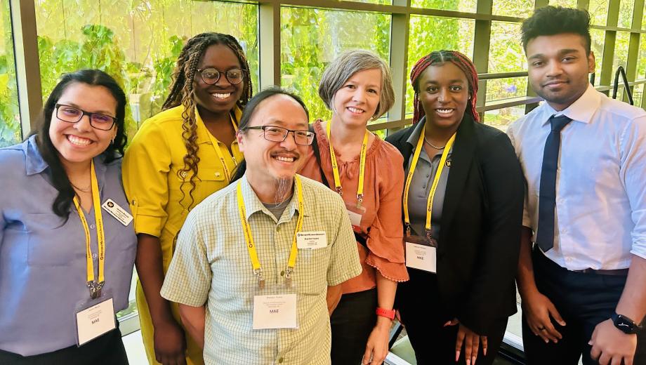 Executive director Lori Wingate, Lab director Brandon Youker and lab staff at MAE COnference