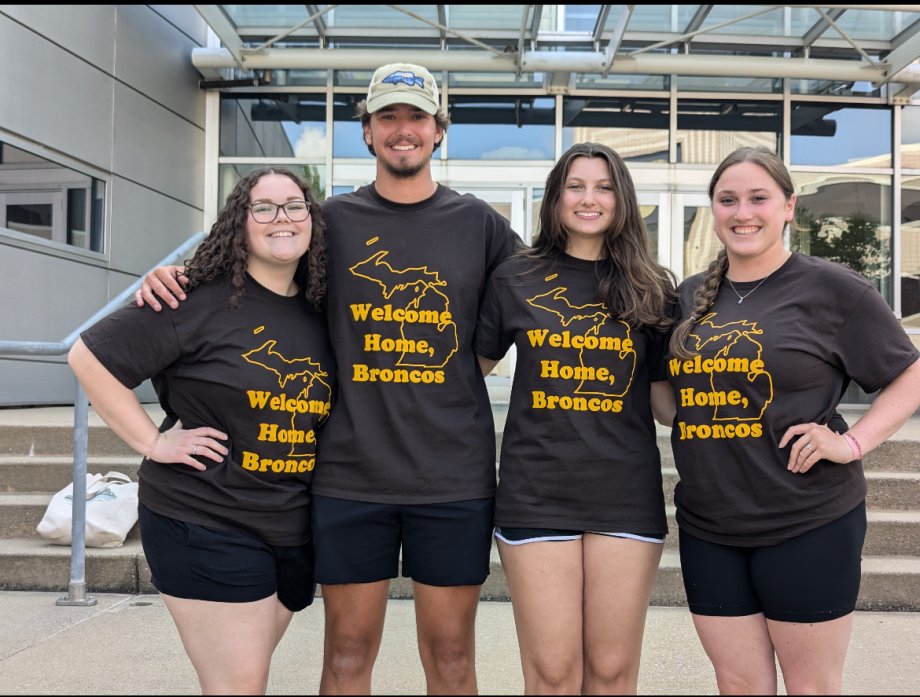 Group of students in front of library.