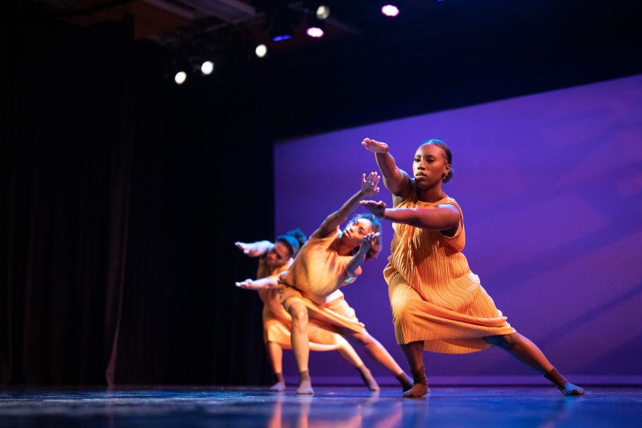 Shaniya Tate and other dancers perform on stage.