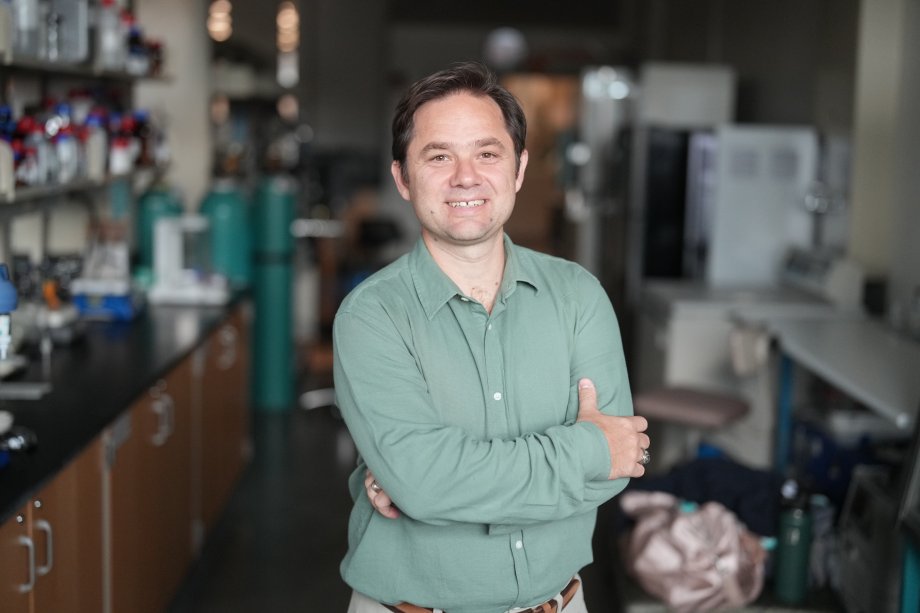 Dr. Mert Atilhan, professor of chemical and paper engineering, stands in his lab in Floyd Hall.