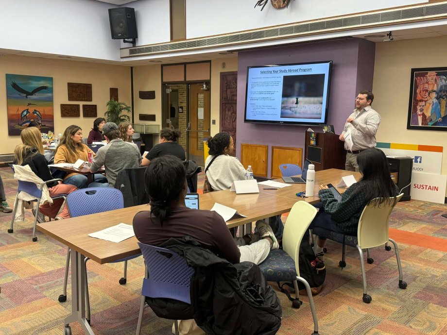 WMU study abroad students attend the Gilman Workshop and listen to a presentation. 