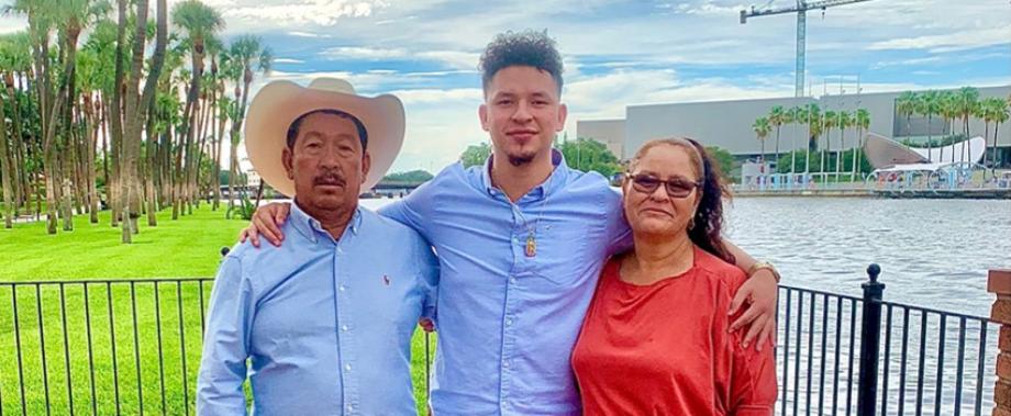 WMU Aviation Flight Science Student Guadalupe Guzman Ramos with his biggest inspiration, his parents