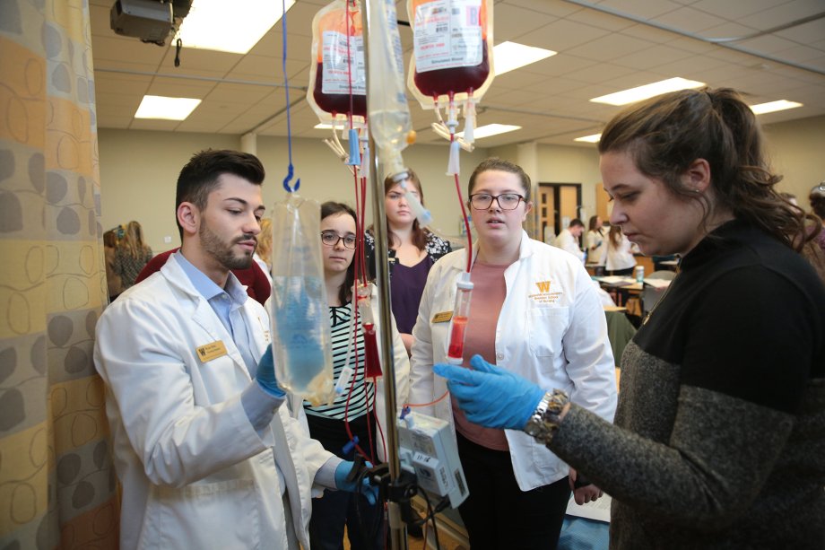 Nursing classroom with several students.