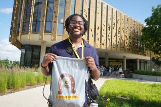 Jonathan Malone stands in front of the WMU Student Center.