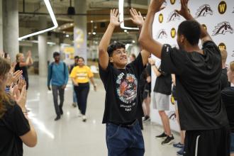 Students are welcomed into the student center.