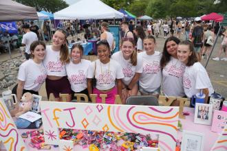 A group photo of Alpha Xi Delta members at Bronco Bash.