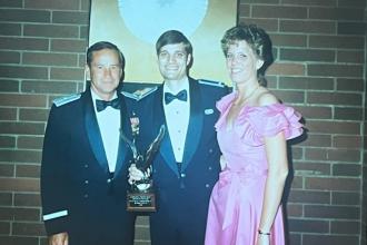 WMU Aviation Alumni and Retired Air Force Officer Tracy Smiedendorf receiving the Junior Officer of the Year Award