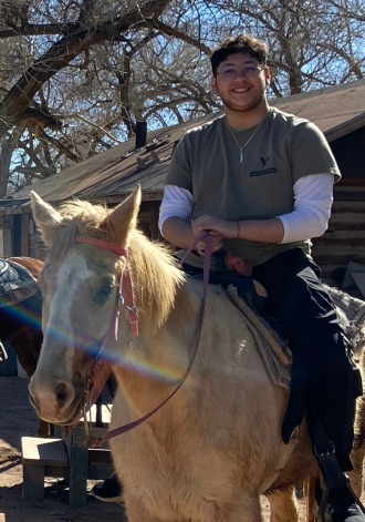 Ridha Chehime riding a horse.