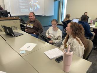 Students laughing in a class of Global Studies in the Field.