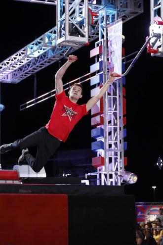Michael Vasilevich swings on an obstacle course.