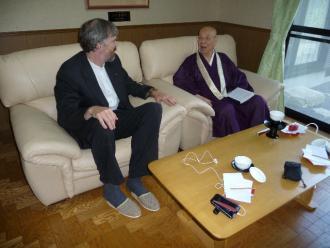 Covell, at left, interviewing head priest of the Tendai Denomination of Buddhism