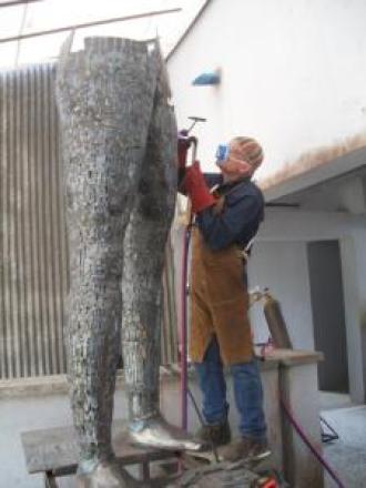 WMU Sculptor Albert LaVergne working in Nigeria on "The Gift."