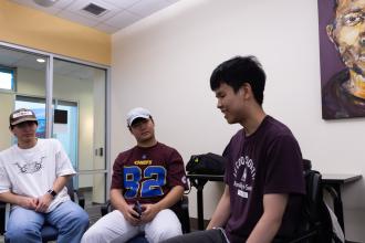 A blind student enjoying a Conversation Circle at WMU