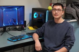 doctoral student at computer