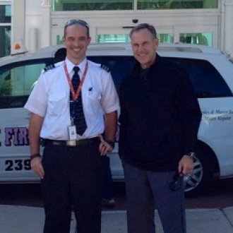 WMU Aviation Flight Science Alumni Nick Garrod with Mark Dantonio