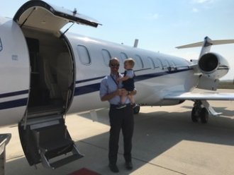 WMU Aviation Flight Science Alumni Nick Garrod in front of a Lear 75