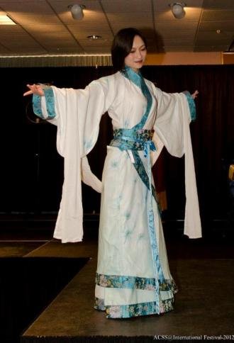 Qi enjoys visiting Lake Michigan beaches close to Kalamazoo.