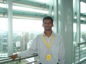 Subramain at the Petronas Towers in Kuala Lumpur, Malaysia.