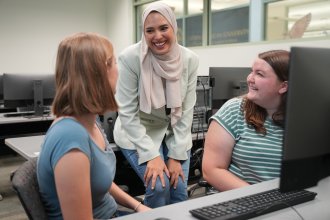 Dr. Nada Lachtar, center, with Melanie Caggiano and Molly Blanchard, undergraduate students.