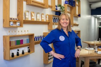 Tanya Thompson stands inside The Aroma Labs' Kalamazoo location on the downtown mall.