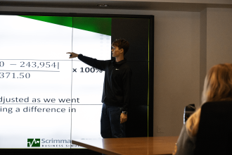 Van Buren Tech student gives a presentation in the conference room